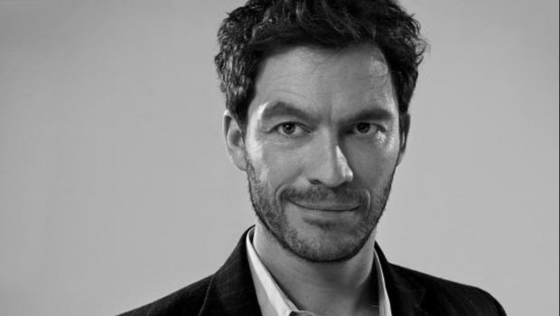 Photo of Dominic West.